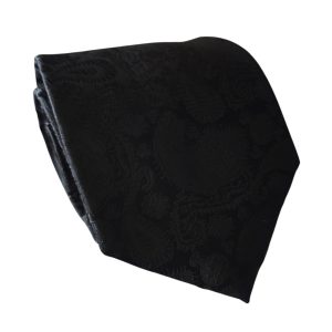 corbata negra tejida sobre tono paisley